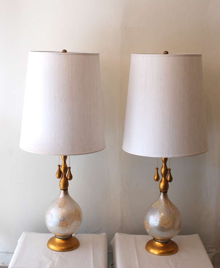 These lamps measure four feet tall.  The 9