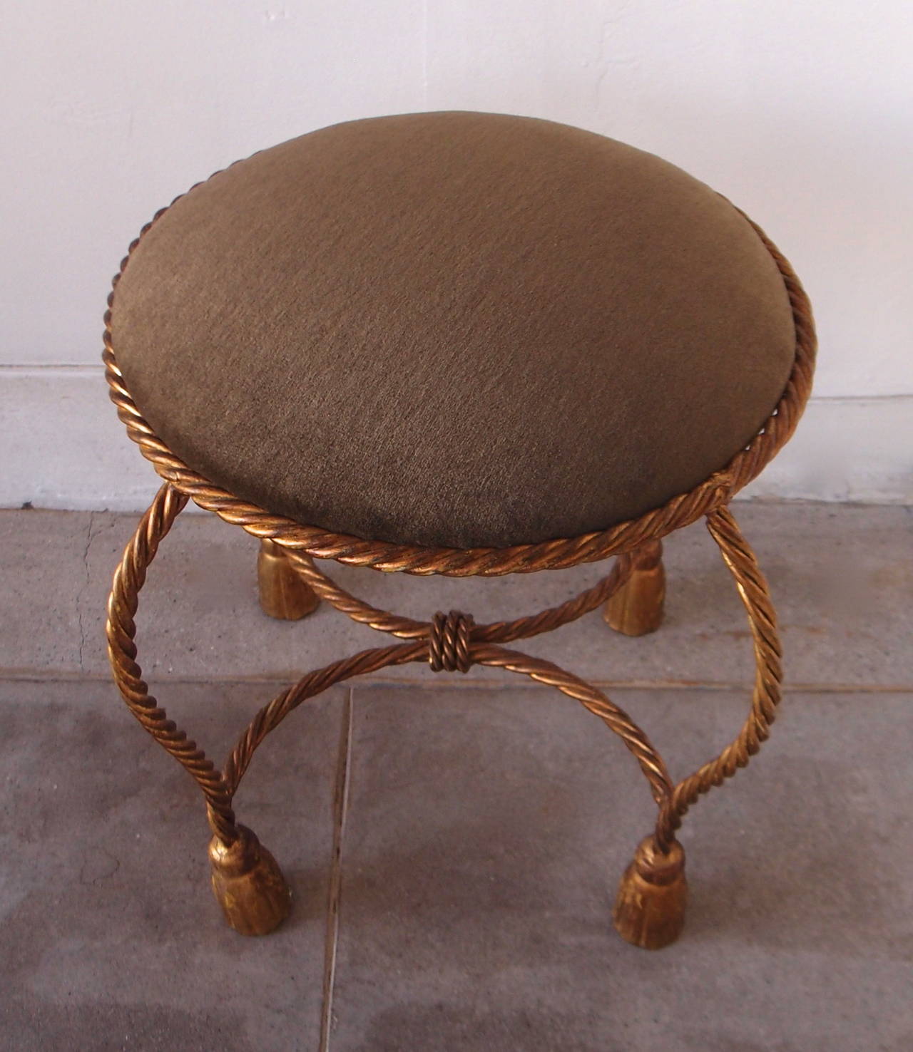Classic Italian gilded rope vanity stool with lovely tassle feet.  The seat has been recovered in a luxurious moss green mohair.  The seat circumference is 16