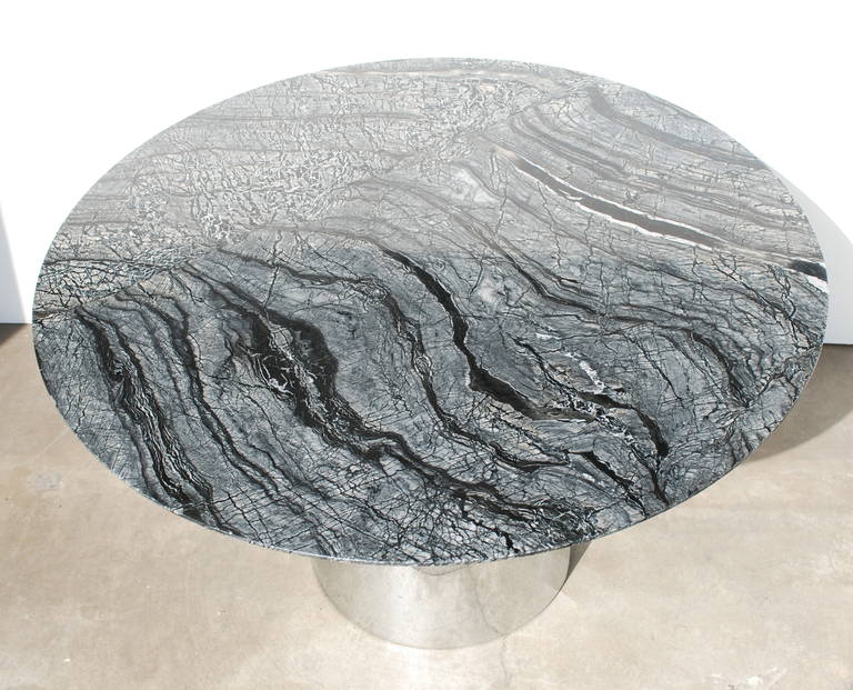 This vintage solid stainless drum base is Knoll (made in Canada) which we had chromed for a perfect finish.  There is a knife edge Florence Knoll style marble top that has been fabricated out of a hand selected gorgeous piece of Black Kenya marble