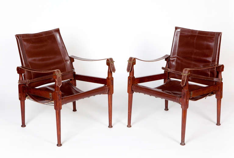 Danish Teak and Leather safari chairs.