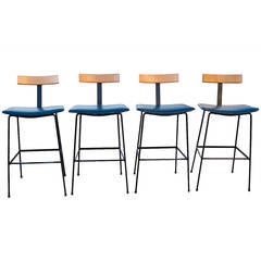 A set of four Kandya stools designed by Frank Guille