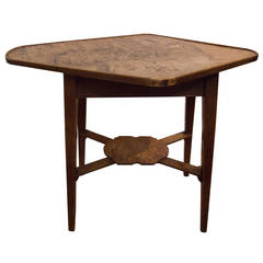 An unusual oval shaped burr oak side table c 1860