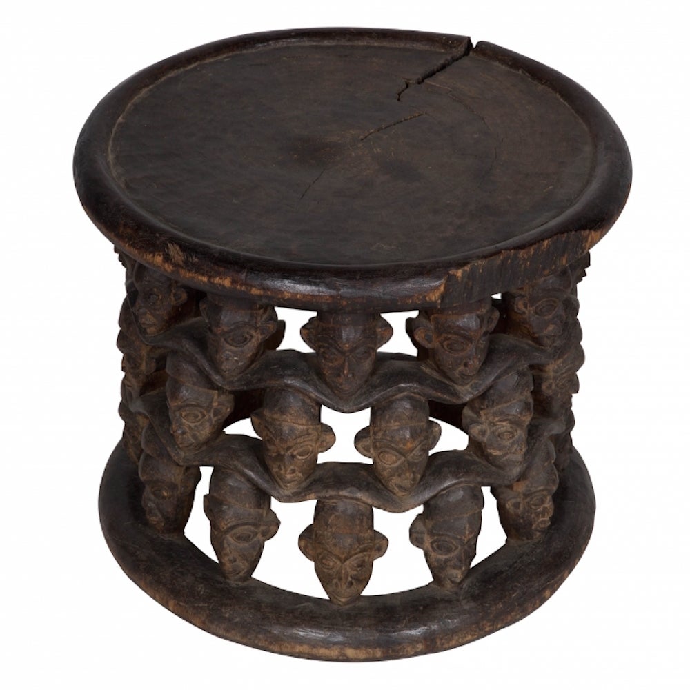 Carved hardwood stool, circa 1920.

Finely carved hardwood stool from the Highland Grasslands of the Cameroons, circa 1920.