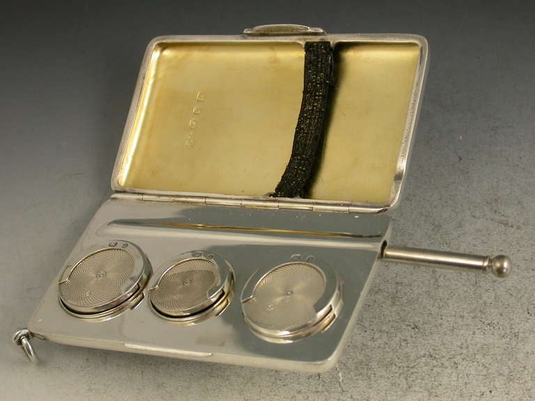 A good Victorian silver combination triple Sovereign Case, combined with a Cigarette Case and complete with an integral silver Propelling Pencil. The rounded rectangular case with a sprung hinge and securing clasp. The interior with three sprung