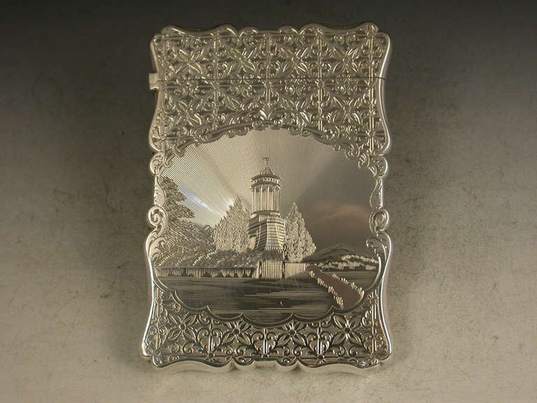 A very fine Victorian silver card case of shaped rectangular form with hinged lid, the reverse engraved with a geometric pattern and diamond shaped cartouche engraved with contemporary initials. The face with a similar pattern and a shaped panel