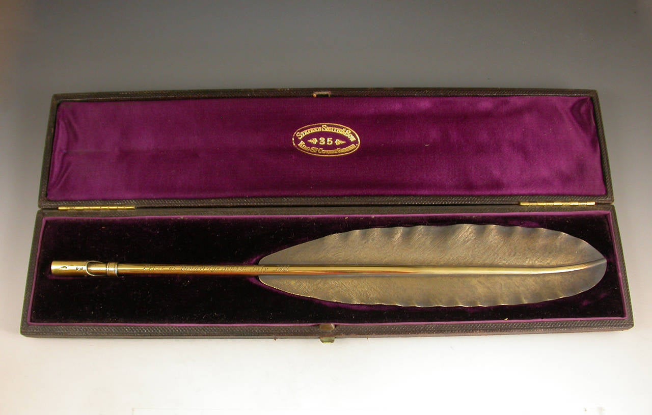 A very fine quality Victorian cased silver gilt Prize Pen, made in the form of a Quill, the feather with fine textured decoration, a Bramah type quill holder to the point, the stem inscribed; 