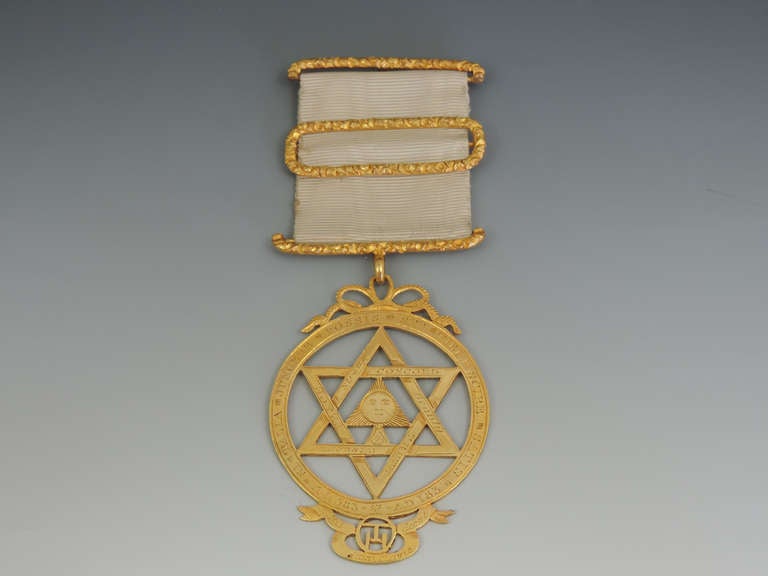 An extremely rare early 19th century Masonic gold Royal Arch Chapter Jewel, of typical 