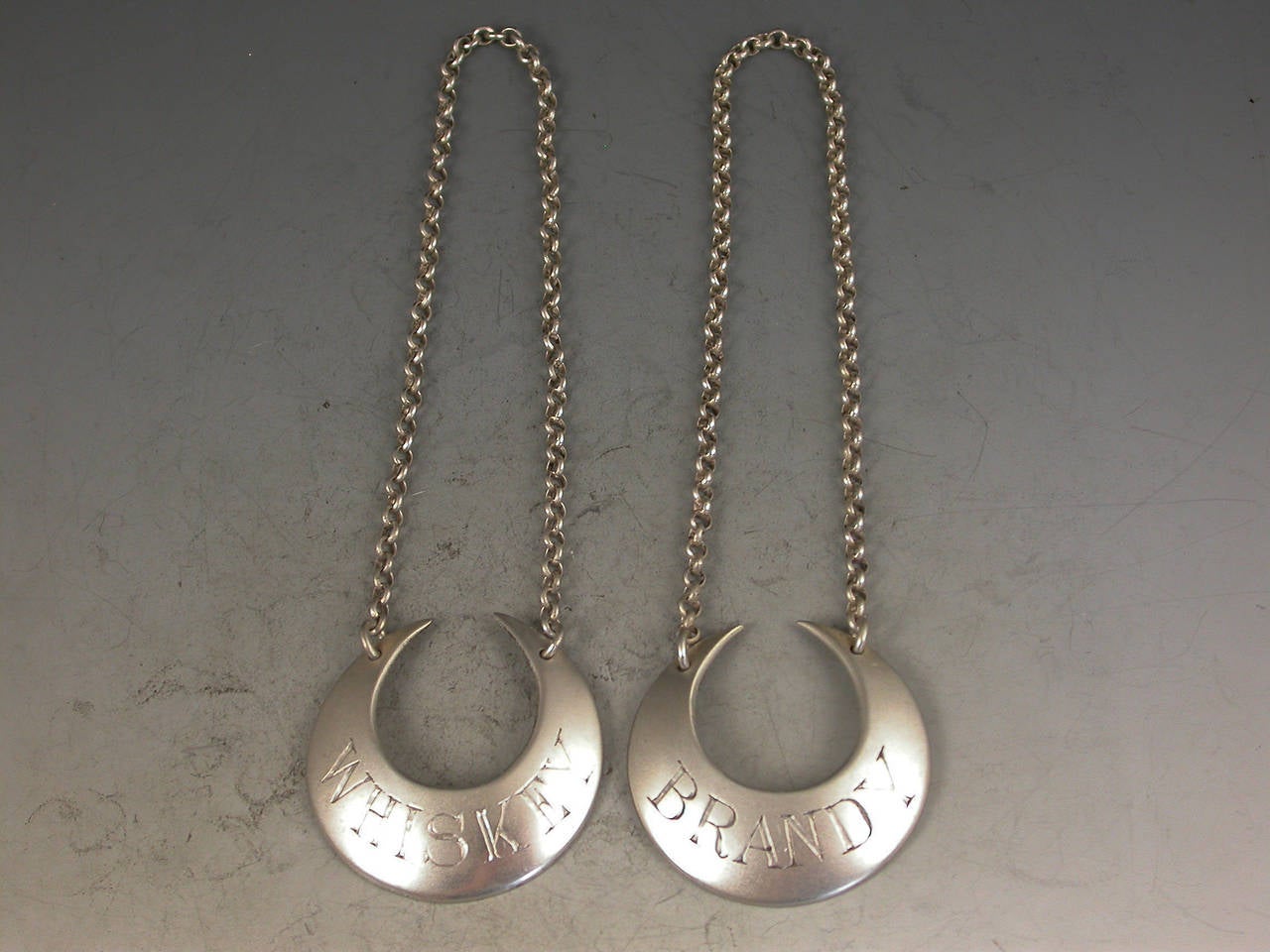 Pair George IV Provincial Silver Wine Labels Incised for Whiskey and Brandy