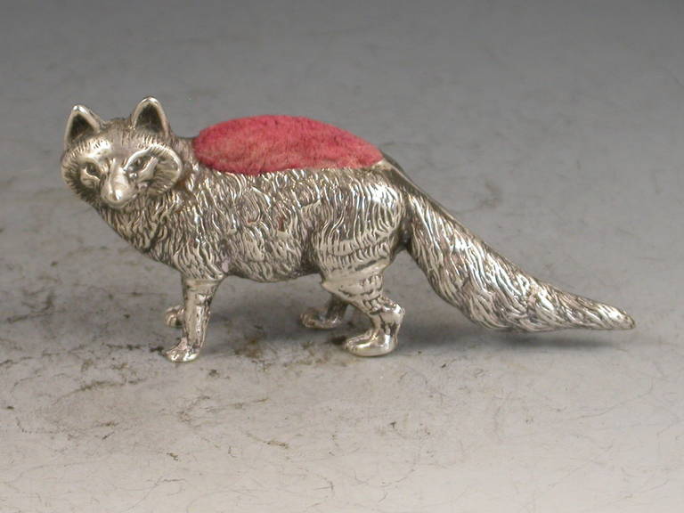A rare Edwardian novelty silver Pin Cushion made in the form of a Fox, with pink velvet cushion. 

By Levi & Salaman, Birmingham, 1905