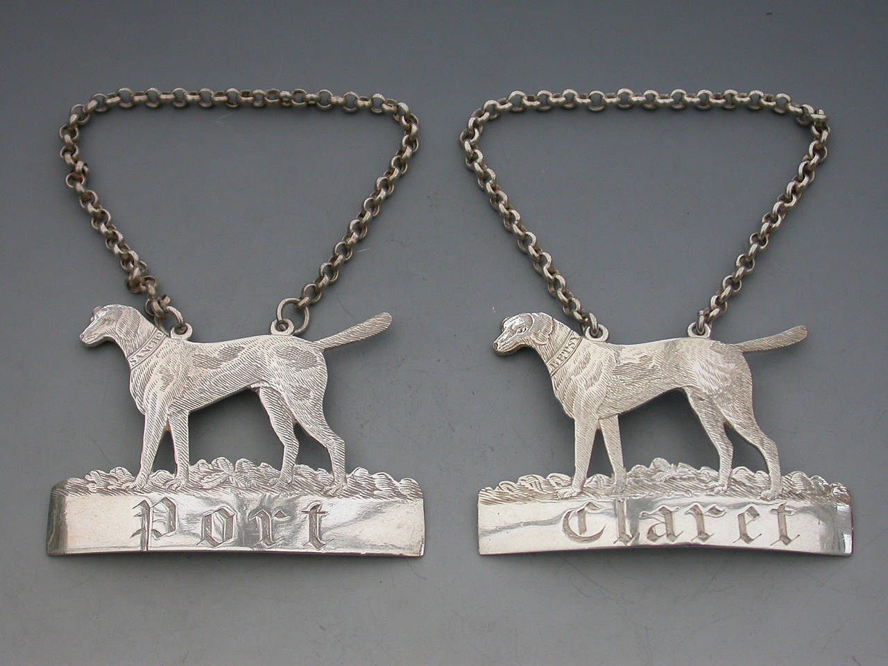 Pair of George III Scottish Silver Foxhound Wine Labels of Sancho & Betsy