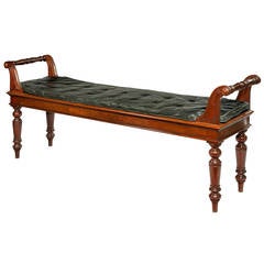 A Victorian mahogany hall bench of distressed black leather squab. 8