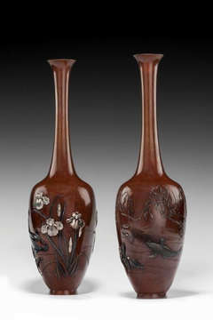 A pair of Bronze Vases