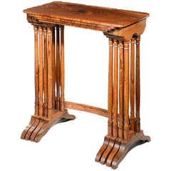 A nest of regency rosewood tables attributed to Gillows.