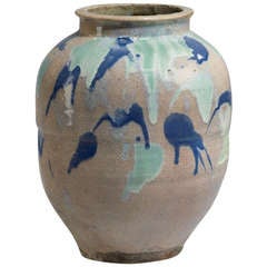 Asian earthenware vase with enamel splash decoration