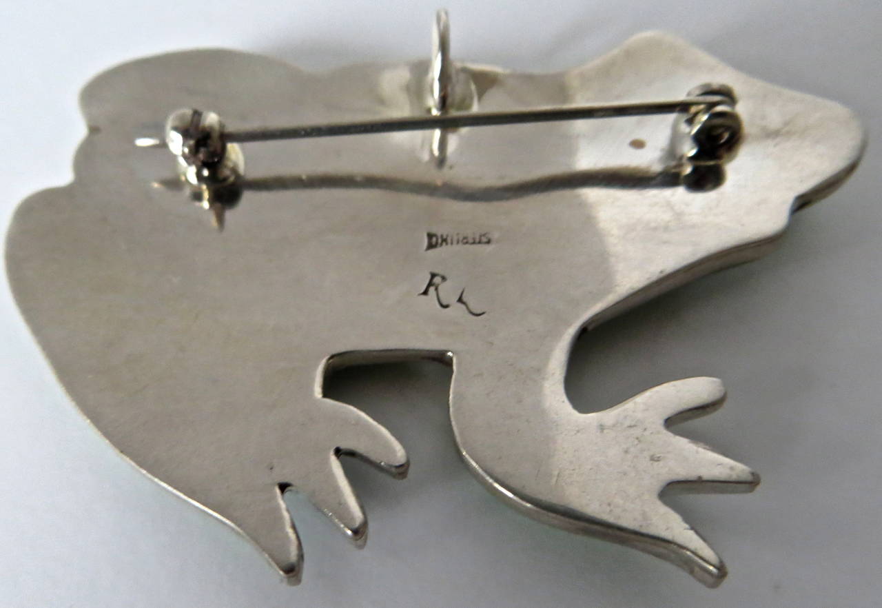Frog pendant is enamel on sterling silver. Measures: 2 1/4