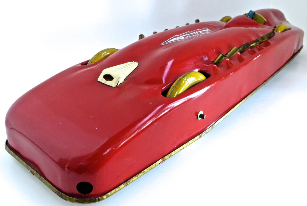 This toy was manufactured in 1928 by The Buffalo Toy & Tool Works Company located in Buffalo, New York. It was undoubtedly produced to cash in on the interest created by automobile land speed records made by Sir Malcolm Campbell of Great Britain, in