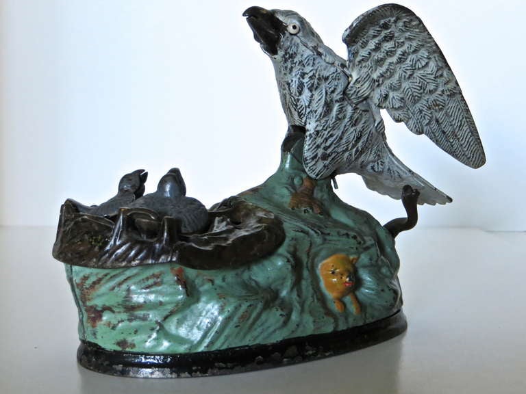 Americana as depicted by the American eagle makes this a cross collectible item for both bank collectors and those who collect period Americana.  Manufactured in 1883 by the J. & E. Steven's Company in Cromwell, Connecticut, this cast iron