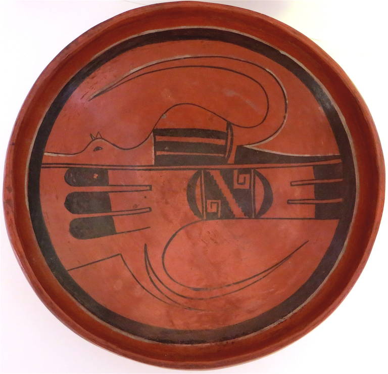 This Hopi bowl is typical of the ancient abstract, geometric avian design revived by a woman potter, Nampeyo, after an 1895 excavation of Sityaki which was a Hopi village abandoned in 1500 AD. The village was located near, what is now, Northeastern