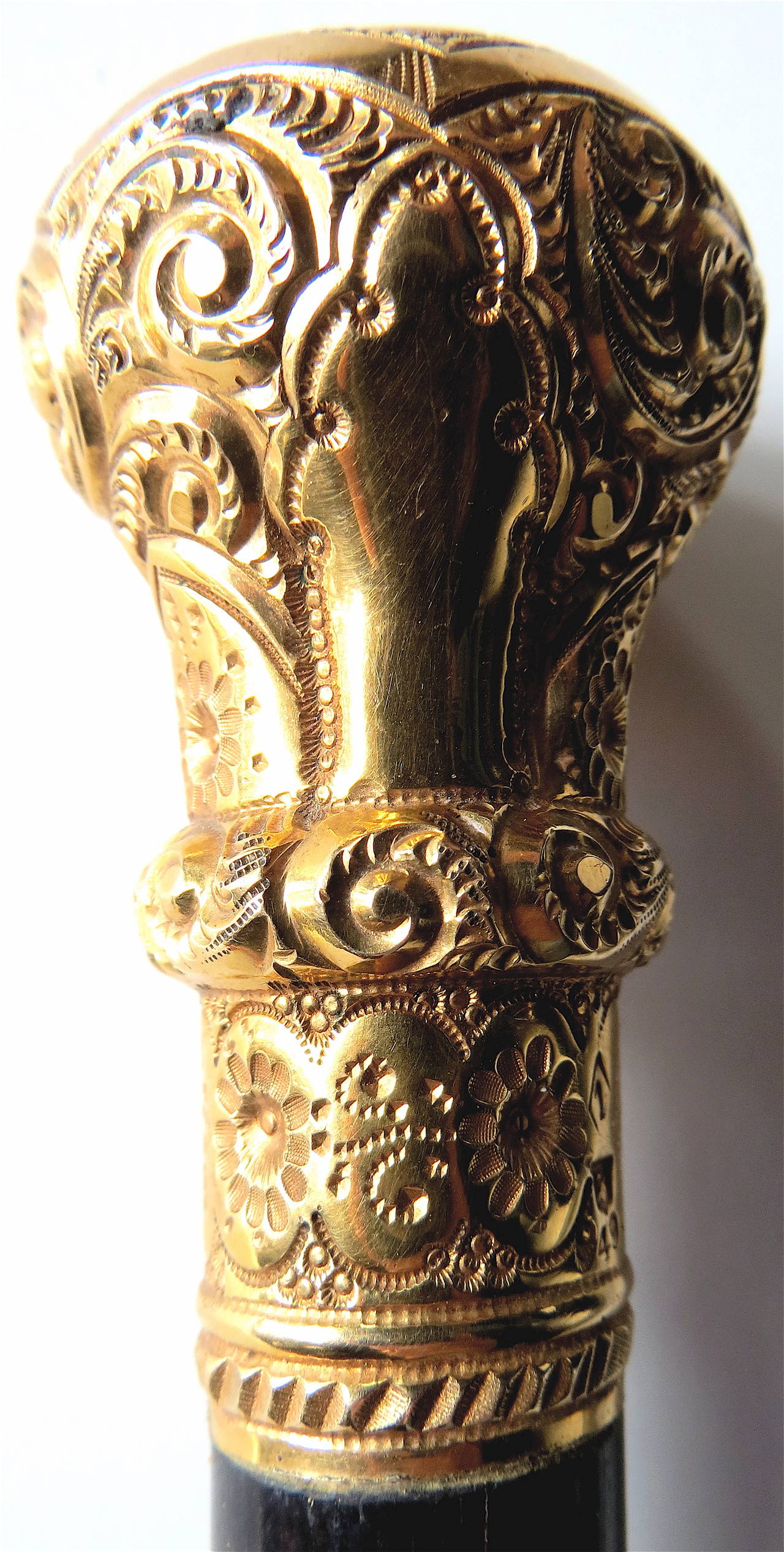 Commemorative cane was a gift celebrating one's 50th wedding anniversary, as evidenced by the inscription at the top (see image). The name of the recipient in script is difficult to decipher in its entirety. 
