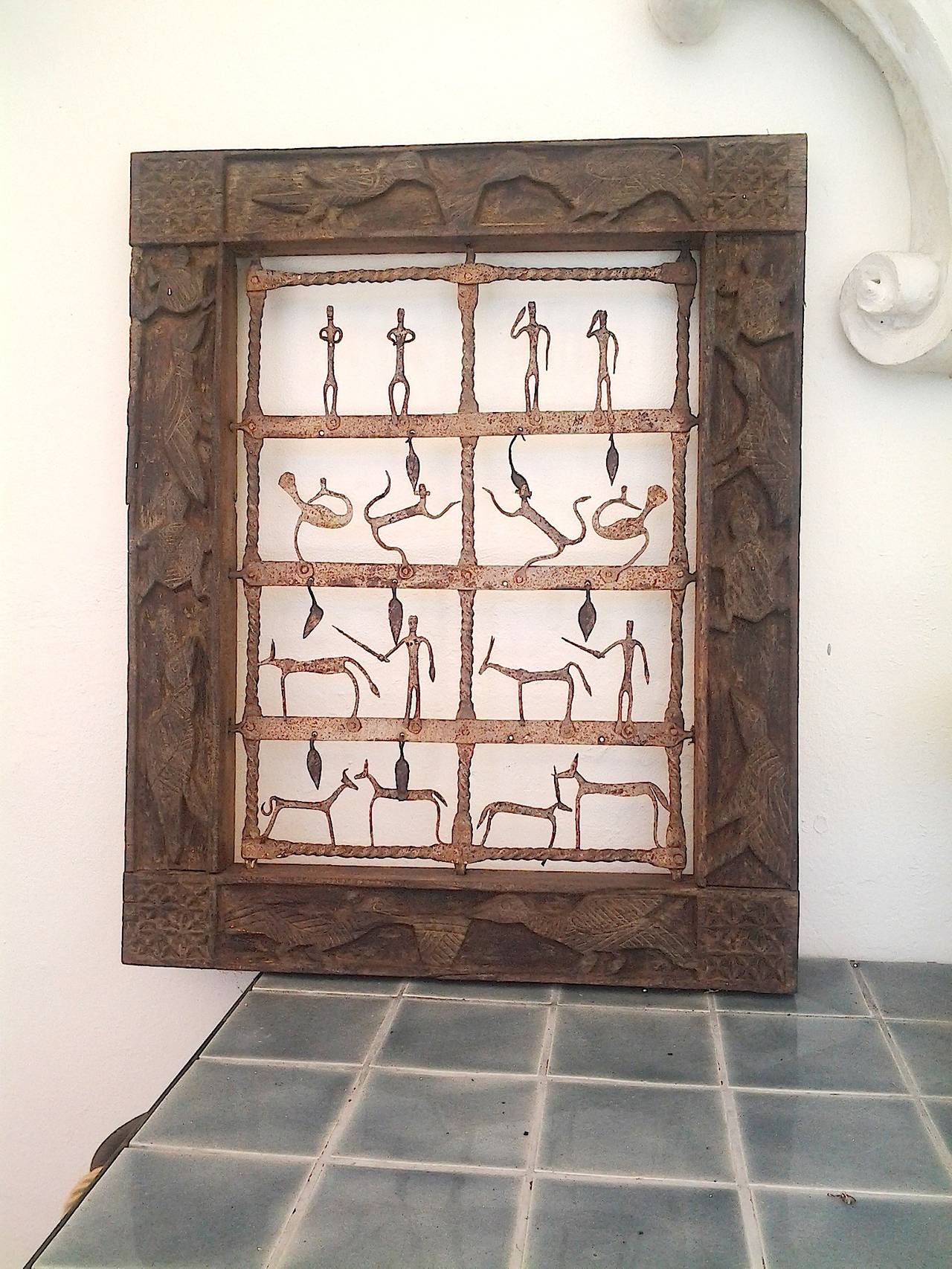 Ethnographic Pair of Wood Carved Animals Wall Panel with Metal Animals & Figures In Good Condition For Sale In West Palm Beach, FL