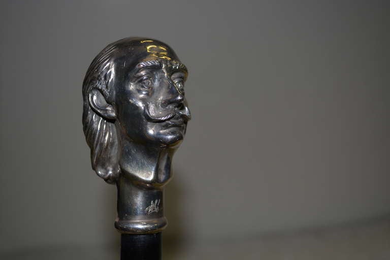 circa 1970 Most Rare & Unique Silver Plate Sculpture Walking Stick on an Black Wood Cane-- Salvador Dali Image Bust with His Signature on the Neck-on An Art Walking Stick Fabricated by the Artist JC-as signed below the ear in the 1970's. Silver Bust