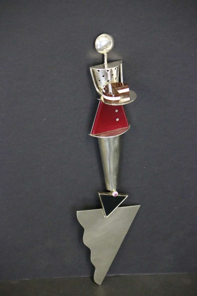 Fabulous stylish serving piece! A piece of art by Noted Museum Artist--Mardi Jo Cohen signed and dated 1989. Fabricated in sterling silver-nickel-acrylic-tourmaline gem stone. A cake/ pie cutter for serving to your most interesting party crowd. A