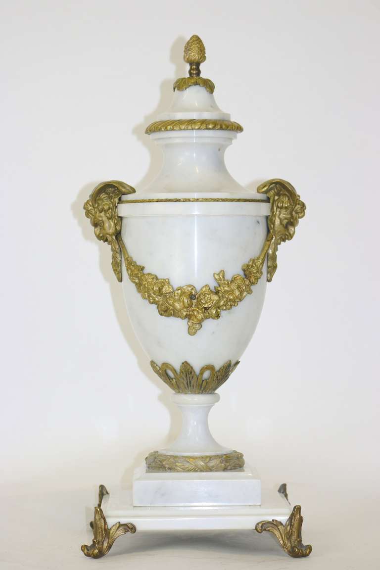 Very fine rare 19th century white marble Cassolette with ovoid marble body, gilt bronze mounts-satyr masks, garlands and swags on four bronze-mounted feet. Reduced from $24,800. to $15,800.
A very large 25 in high will add a had turning impression
