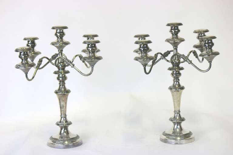 The haute couture of the gilded age and the wow factor is present in the
Large 19th century. Five-Light pair of Sheffield sterling silver candelabras. Right out of Downton Abbey dining room into your home!!! 
Beautifully detailed chasing and