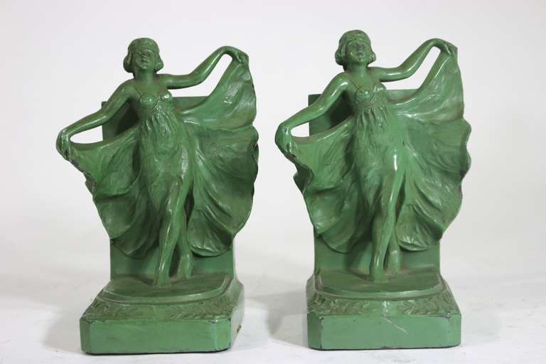 Pair of 1930's Art Deco Bookends of Loie Fuller--the Noted Dancer---Green Patinated Spelter with An Art Deco Decoration on the Rear. There are 3 Pairs Available as an Instant Bookcase Decor Collection.
Provenance-assembled from our family's