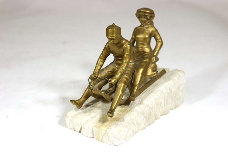 Mid-20th Century Magical Rare Art Deco Sledding Figural Bookends, Marble Carved 'Ice' Base