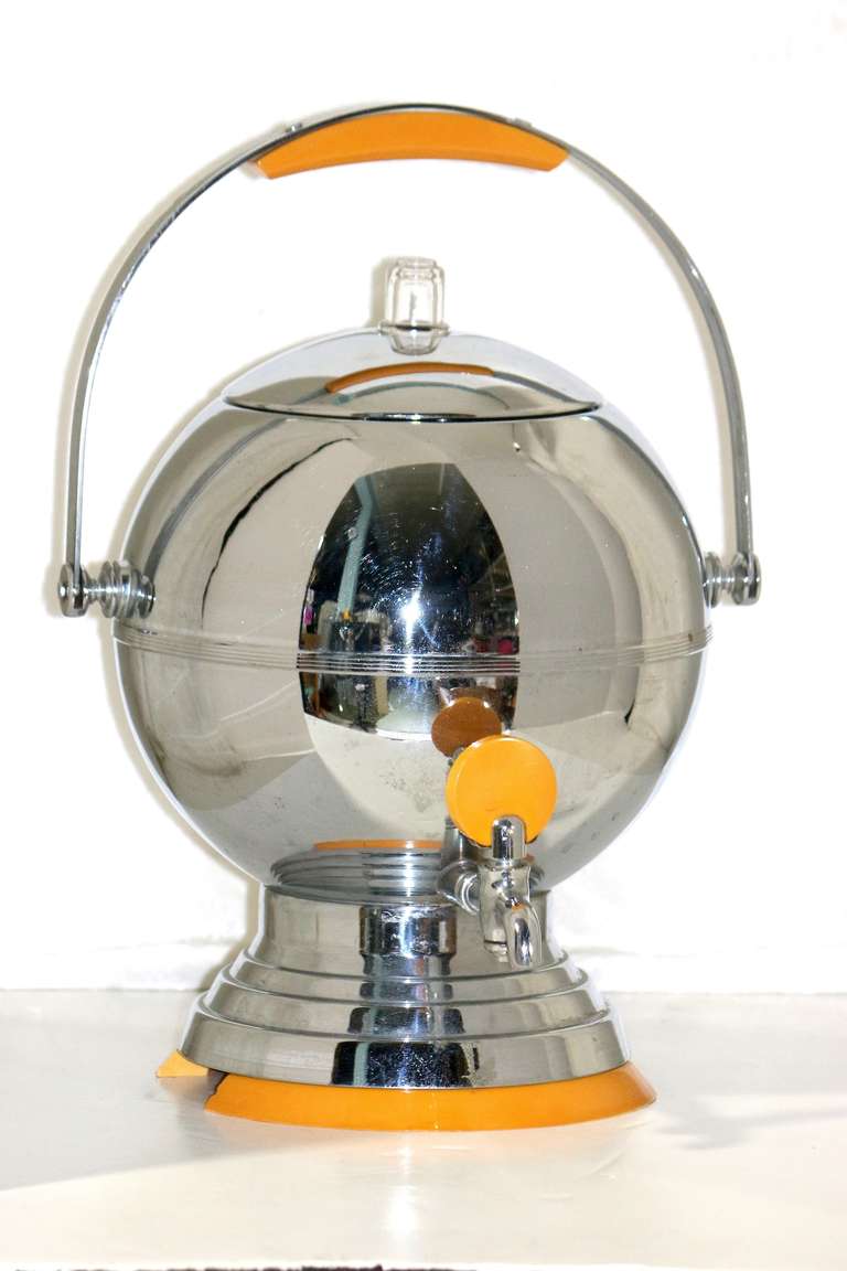 Designed in 1930s at the peak of American Art Deco and inspired by a prototype coffee machine designed by Eliel Saarinen for the 1933 Chicago World fair, this chrome coffee urn was called "Harmony". It features an original crystal filial
