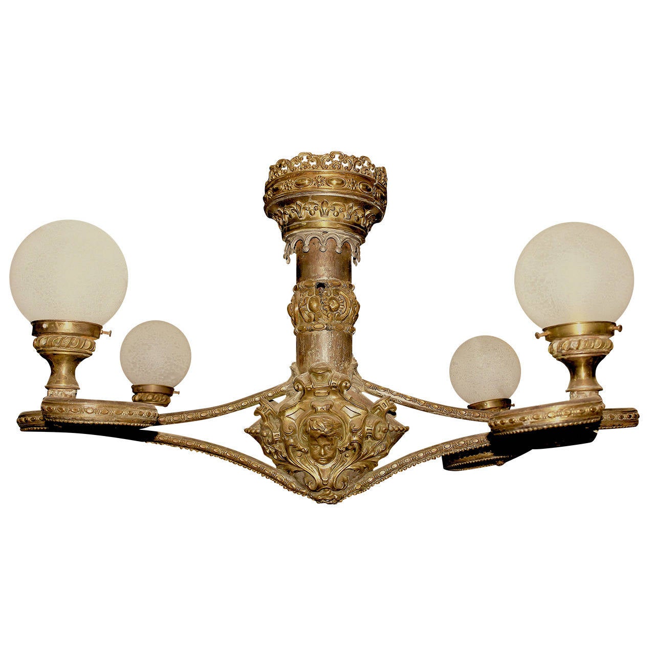 A most incredible, rare, and unique highly decorative monumental beaux arts belle époque chandelier!!!- 4 volute curvilinear repose arms, milk glass globes, brass and zinc stem, repousse faces and elaborate trim- great aged patina of brass & zinc-