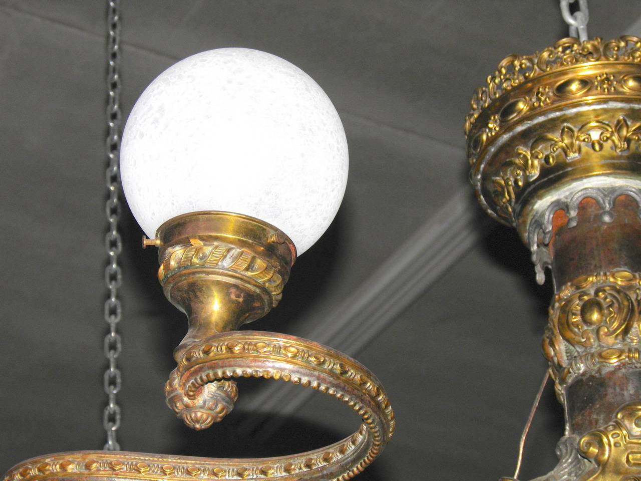 Glass Fabulous Belle Epoque Four-Arm Globe Light Repousse Brass and Zinc Chandelier For Sale