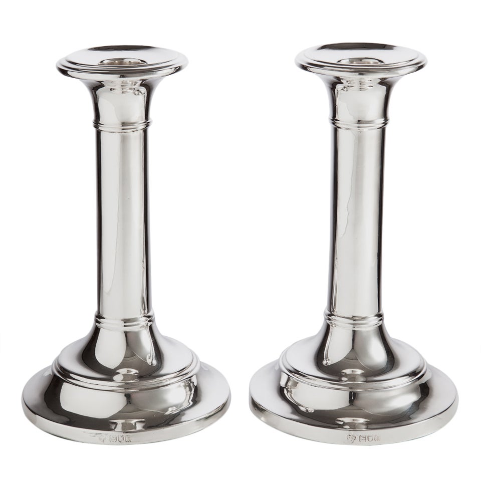 A Fine Pair of Silver Candlesticks in a Classic Style Dated London 1905.