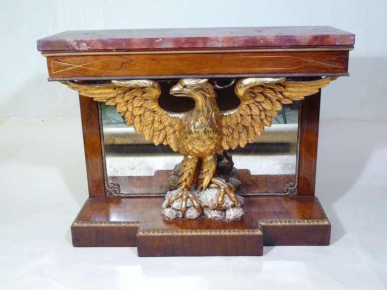 Very Fine Connoisseur Antique English regency style pier table in the manner of William Kent, circa 1860. Crafted from rosewood and mahogany featuring a magnificent detailed gilded eagle with spread wings and an original rouge specimen marble top.