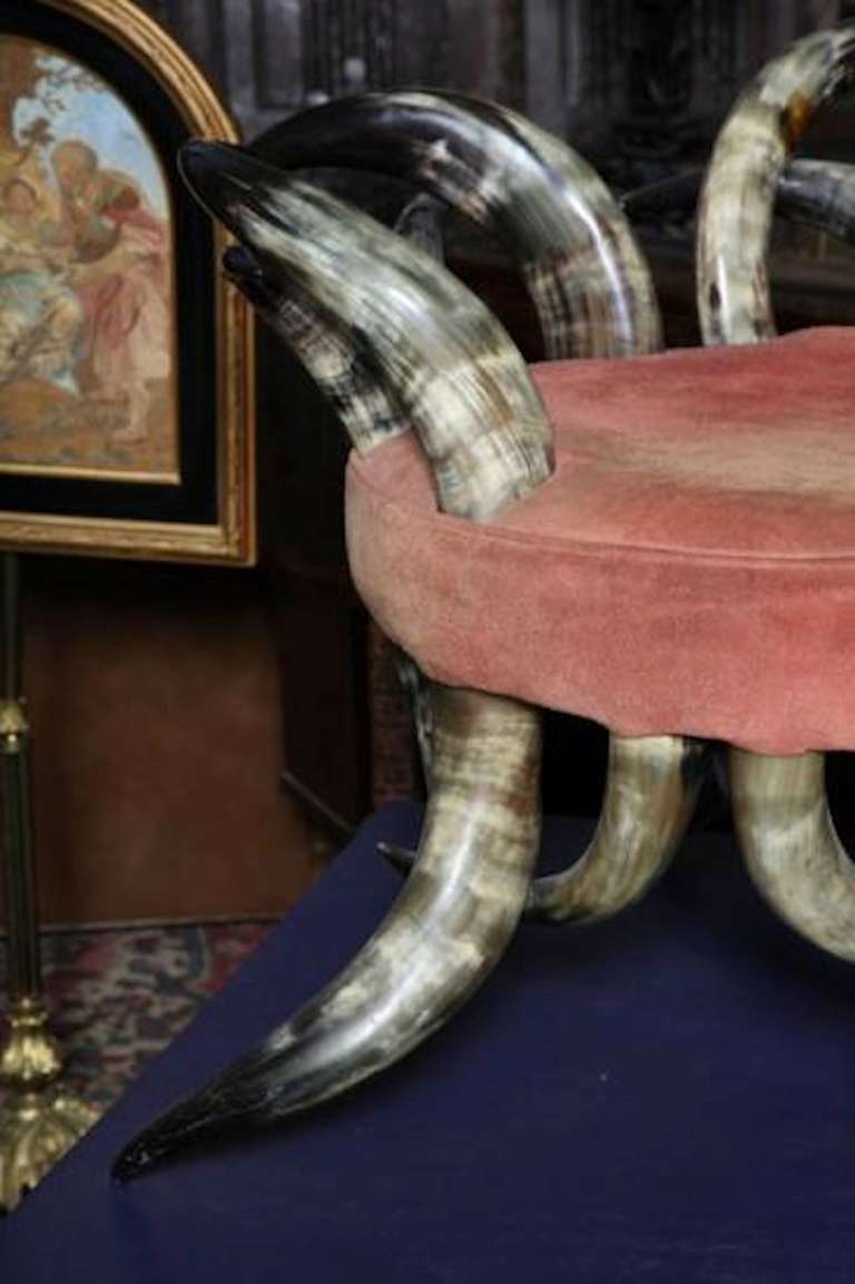 19th century, Victorian American steer horn chaise; museum quality; this is a one of a kind rarity. 36 gleaming polished pearlized steer horns with rawhide suede upholstery. This is nothing like the usual steer Horn furniture that have a much