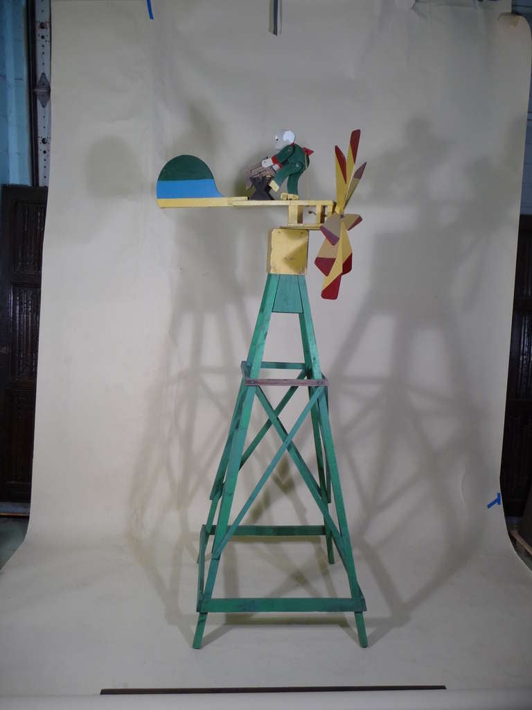 Belonged to an Oil Tycoon William Hale Harkness at his Family Estate.
19th/early 20th century charming Huge American Folk Art original polychrome Kinetic whirligig of a man sawing wood, when the wind blows the man saws, it is in beautiful vivid