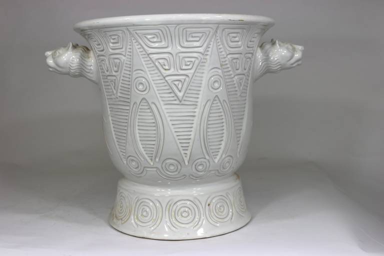 A marvelous 1950s, Mid-Century Large White Ceramic Incised and Relief Decorated Urn with Stylized Lioness Head Handles. Marked Made in Italy--#2019--
Provenance-assembled from our family's Maryland estate, The Edith Hale Harkness estate. The