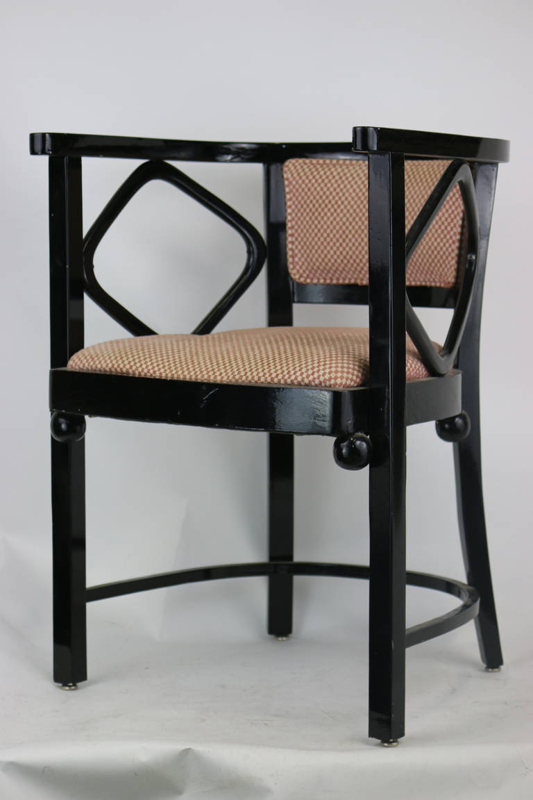Mid-Century Modern 1960s black gloss lacquer armchairs inspired by the Fledermaus chair by Josef Hoffmann, upholstered in a rose and ivory checkered chenille fabric. Wood lacquered chairs in the style of the original, circa 1905 designed by the