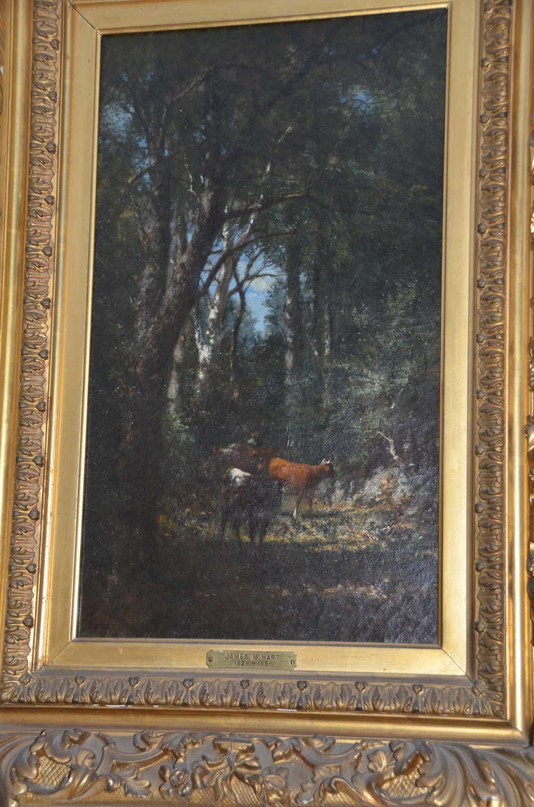 A very fine oil painting by James McDougal Hart 'Cows in a Forest Clearing,' in a beautiful period gilt wood frame (frame value alone is $15,000.)
Hart exhibited his first work at the National Academy of Design in 1848, became an associate in 1857