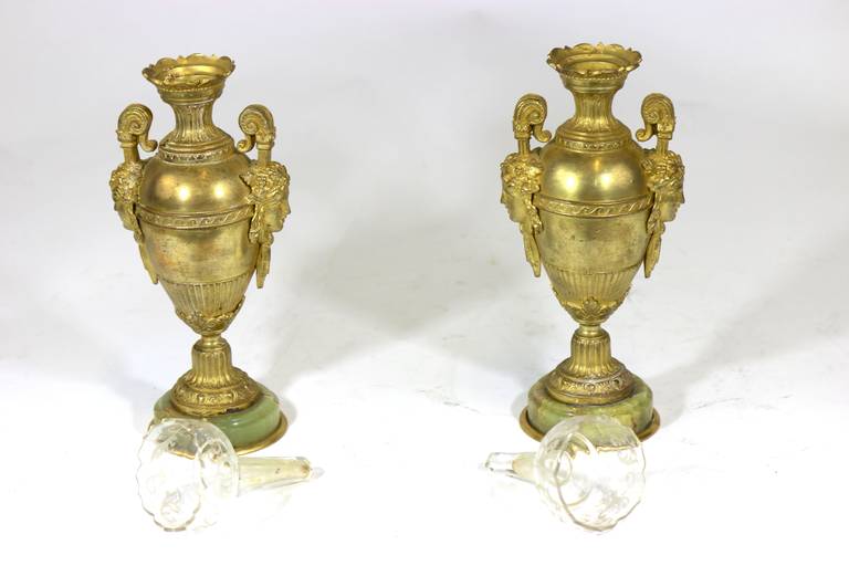 Circa 1850 Rare Very Finely Detailed Pair French bronze Dore vases urns with delicately etched glass inserts and green onyx bases.-Pompeii Inspired with Grecian Faces--  French 19th Century.  priced as a pair 

See the Photo of the Harkness Estate