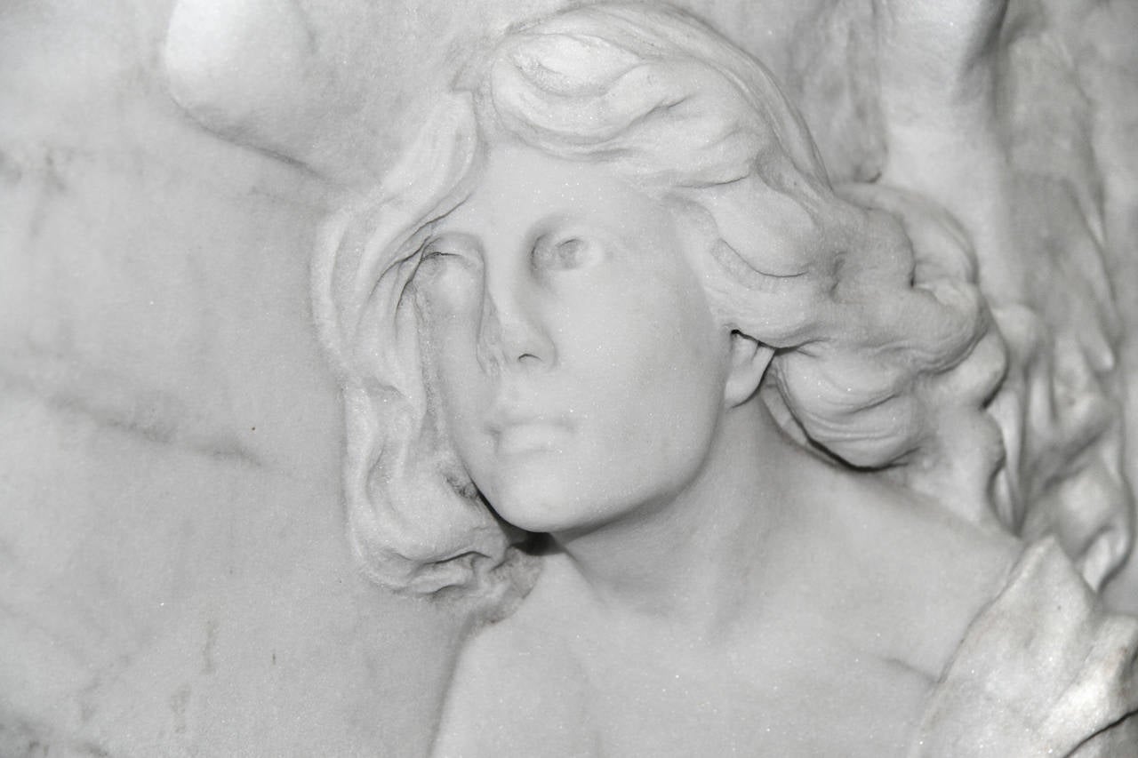 1910 hand-carved marble plaque sculpture from Argentina featuring an angel. There is a little chip on the nose but overall excellent condition. Please note, this item is located in our Scranton, PA location.