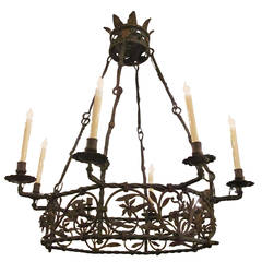 Antique Late 1890s Electrified Hand-Wrought Iron Chandelier with Eight Candle Lights