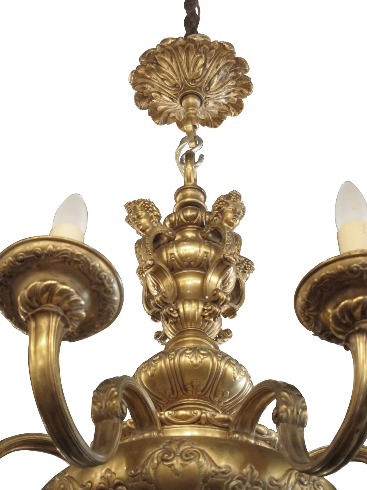 1900s French Made Gold-Plated Eight-Arm Chandelier with Cherub Relief Work In Excellent Condition In New York, NY