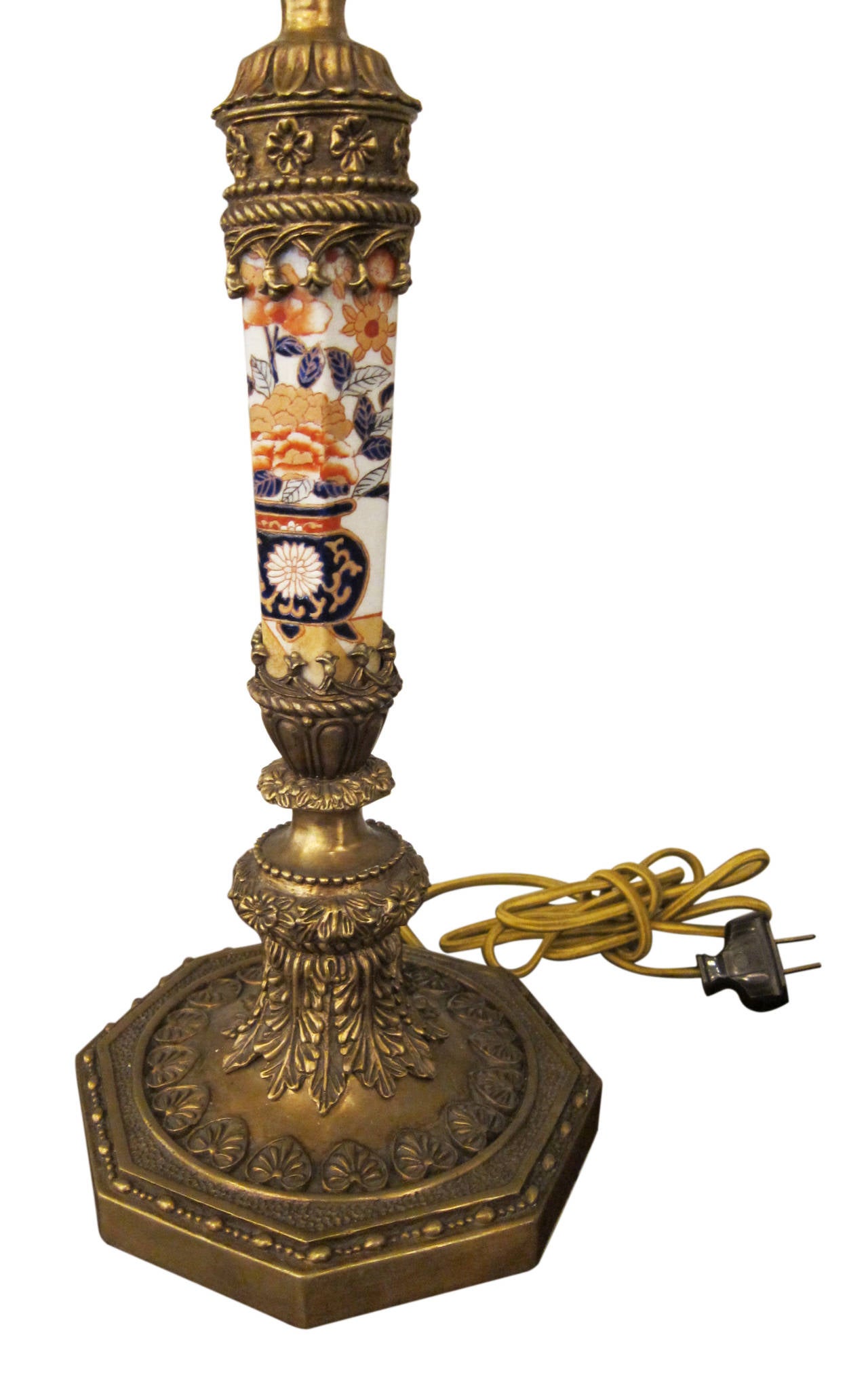 Pair of Imari candlesticks with bronze mounts, converted to lamps, from the late 19th century. These can be viewed at our 149 Madison Avenue location in Manhattan.