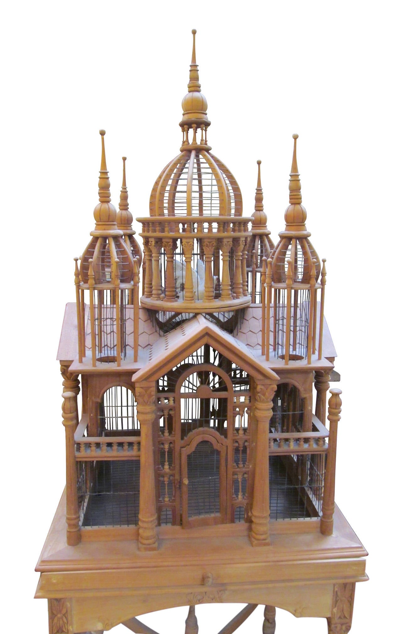 This bird house has been modeled after a mansion with watch towers, roofing and a beautiful wooden base. This item can be viewed at our 5 East 16th St, Union Square location in Manhattan.