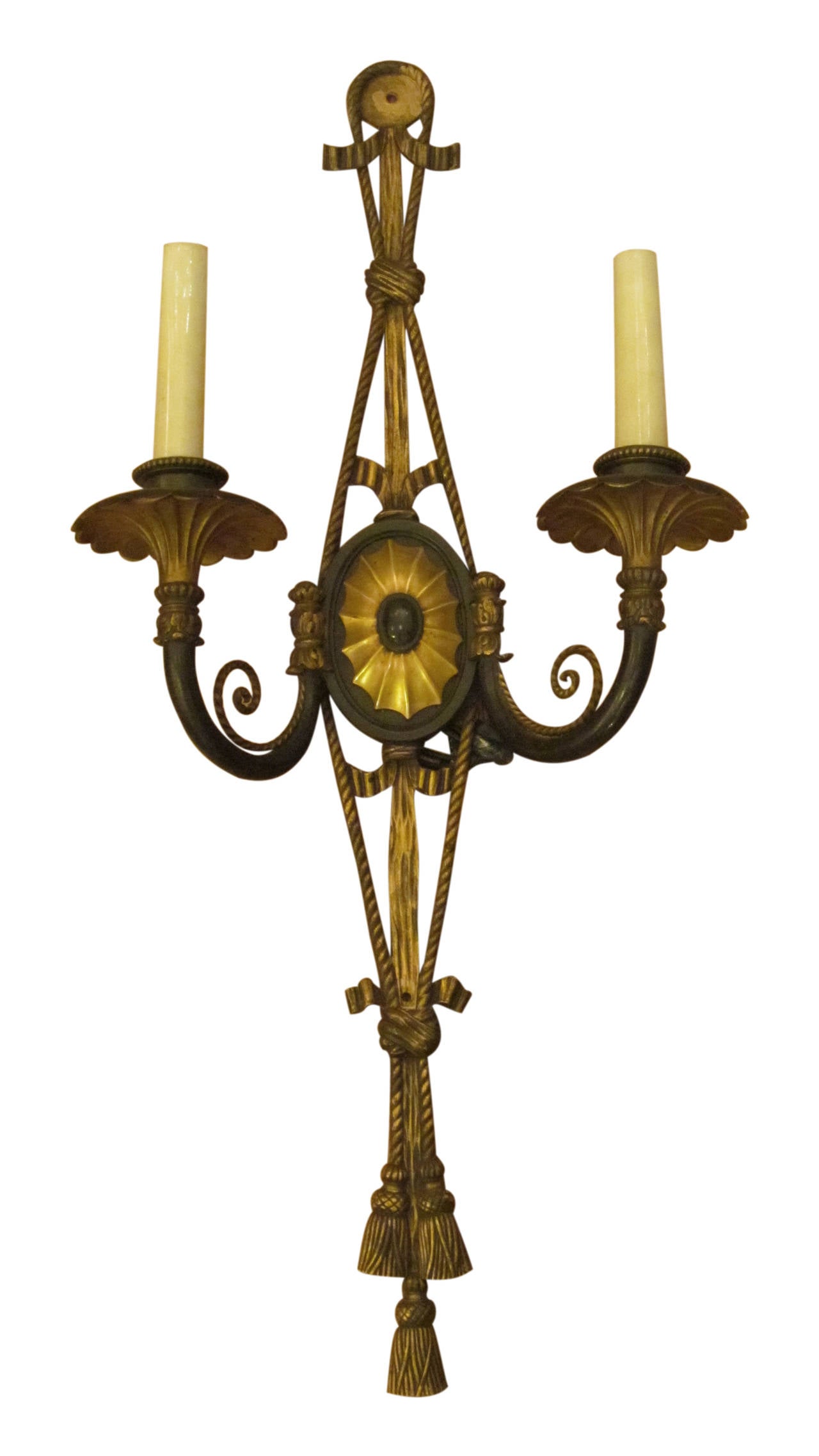 1920s Pair of Caldwell Bronze Sconces with Triple Tassels. Center spider web design. This can be seen at our 2420 Broadway location on the upper west side in Manhattan.
