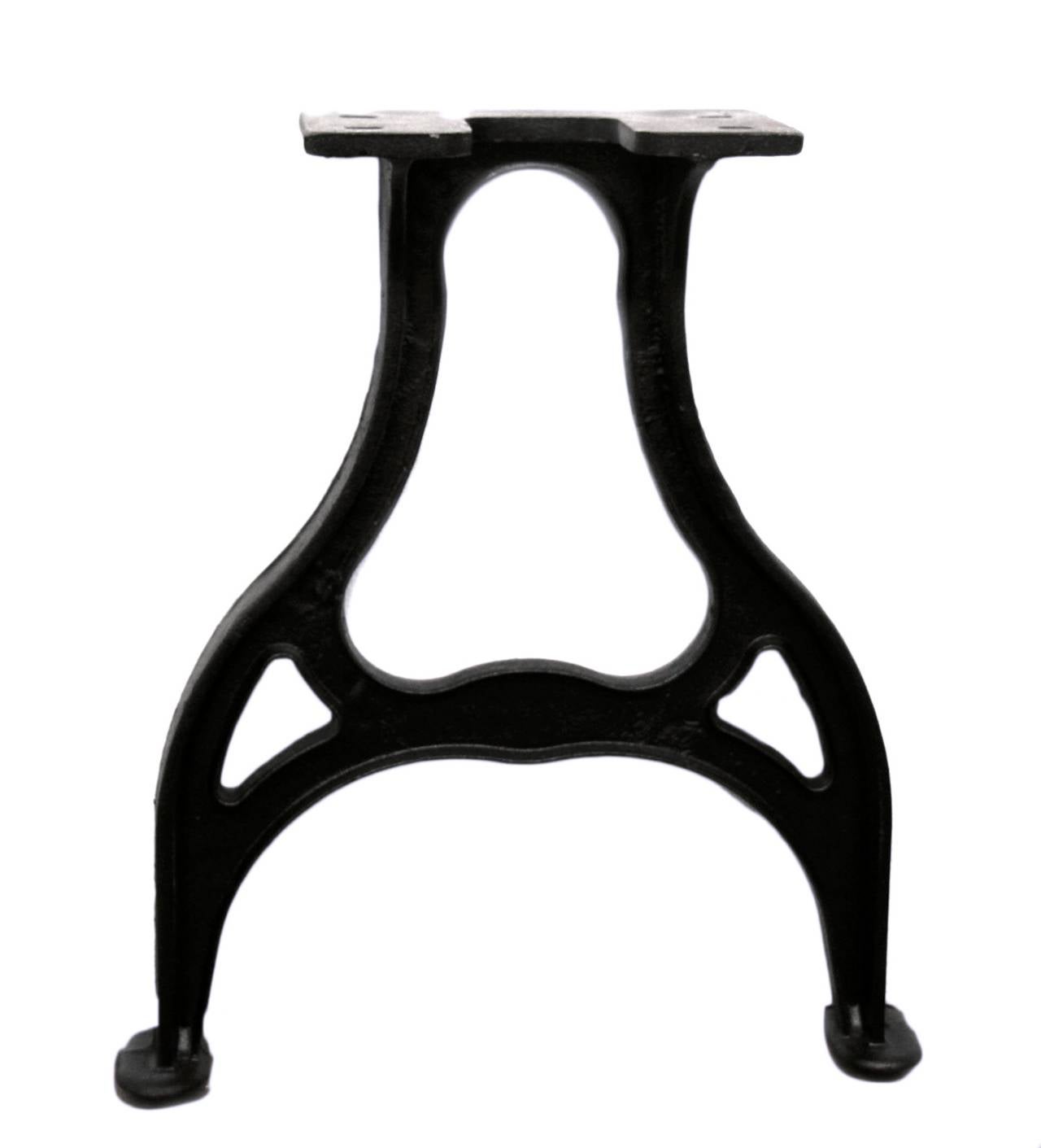 These ductile cast iron table legs have been faithfully reproduced from salvaged machinery from the early 19th century. Their unique shape make impressive looking table legs as well as being extremely stabile. The top plate has four mounting slots