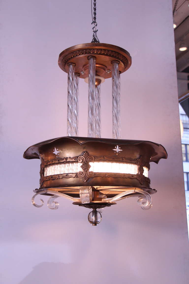 Original Art Deco chandelier made of brass and curved glass from a New York City Theater from 1939. Several available at time of posting. Priced each. Please inquire. This can be seen at our 2420 Broadway location on the upper west side in