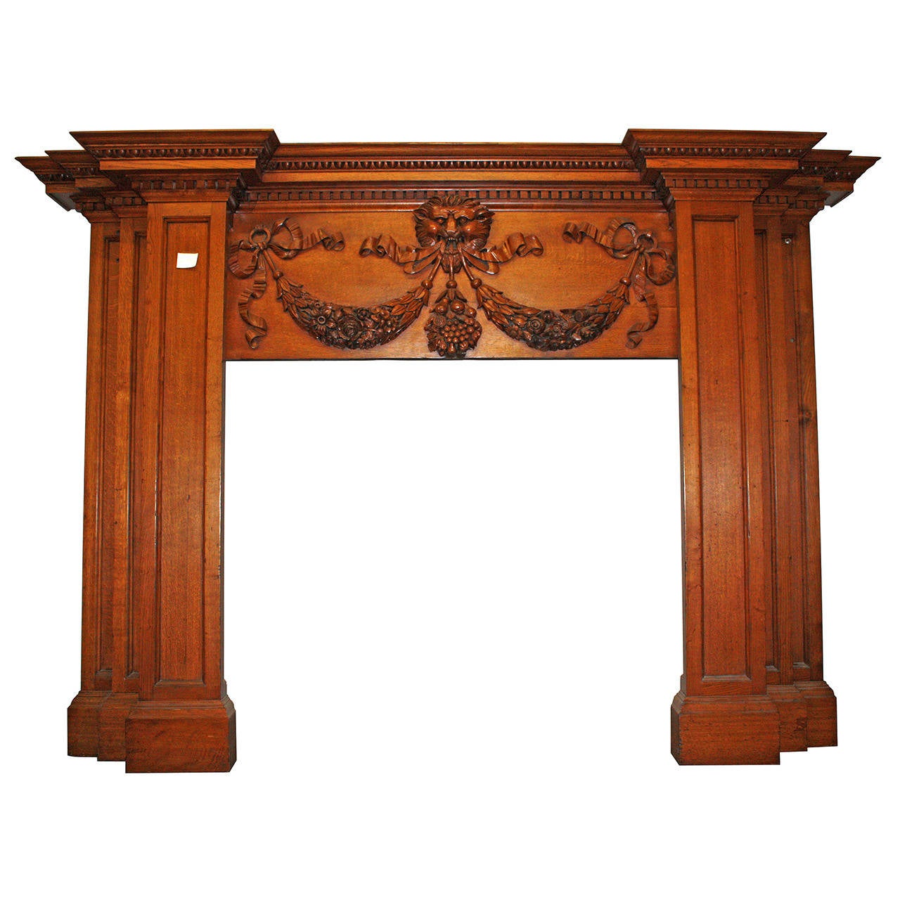 1800s English Regency Style Carved Oak Tall Mantel with Lion, Ribbon